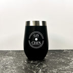 Black insulated tumbler with 'GIN CHIN' text on a grey surface