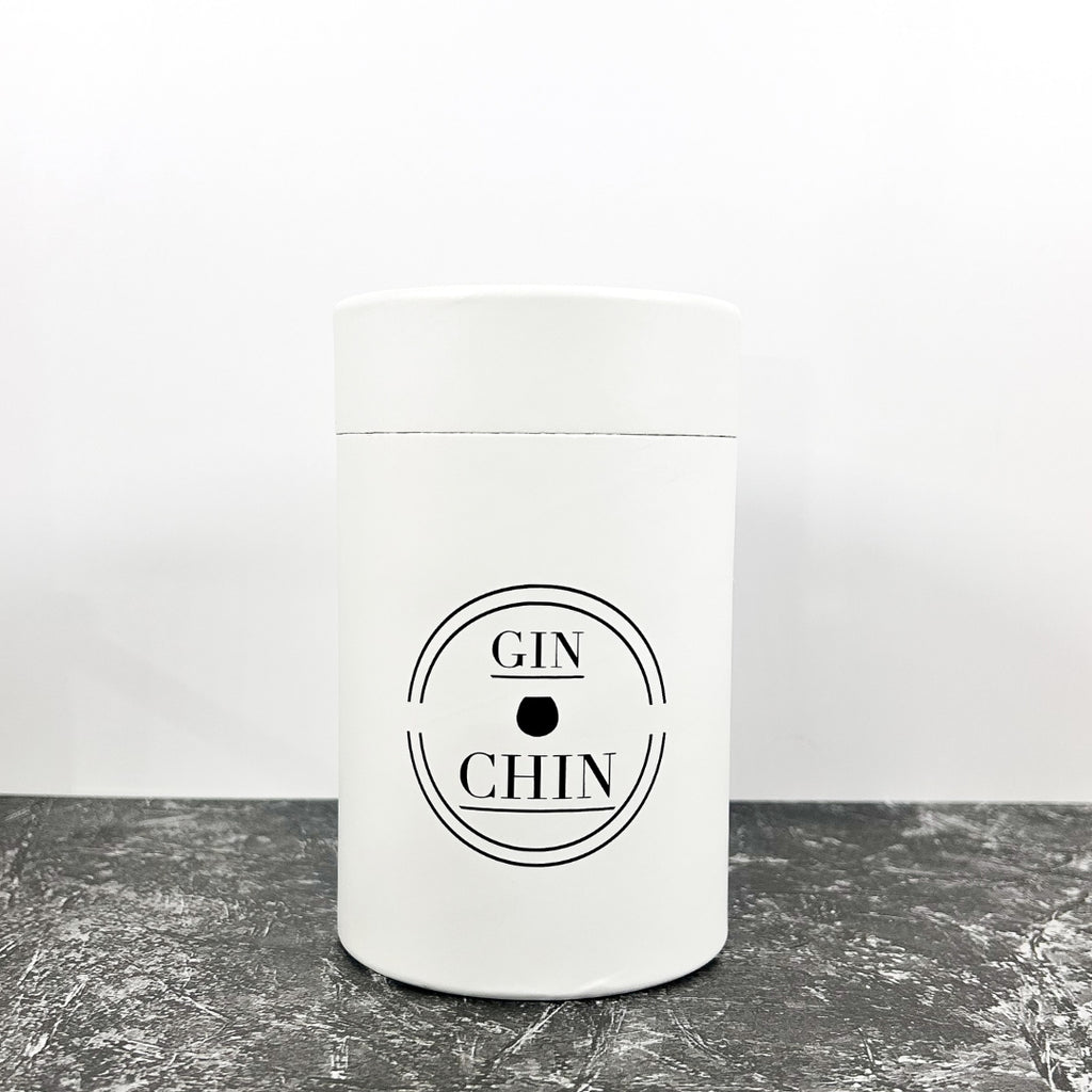 White gift box for insulated travel tumblers with 'GIN CHIN' label on a grey surface