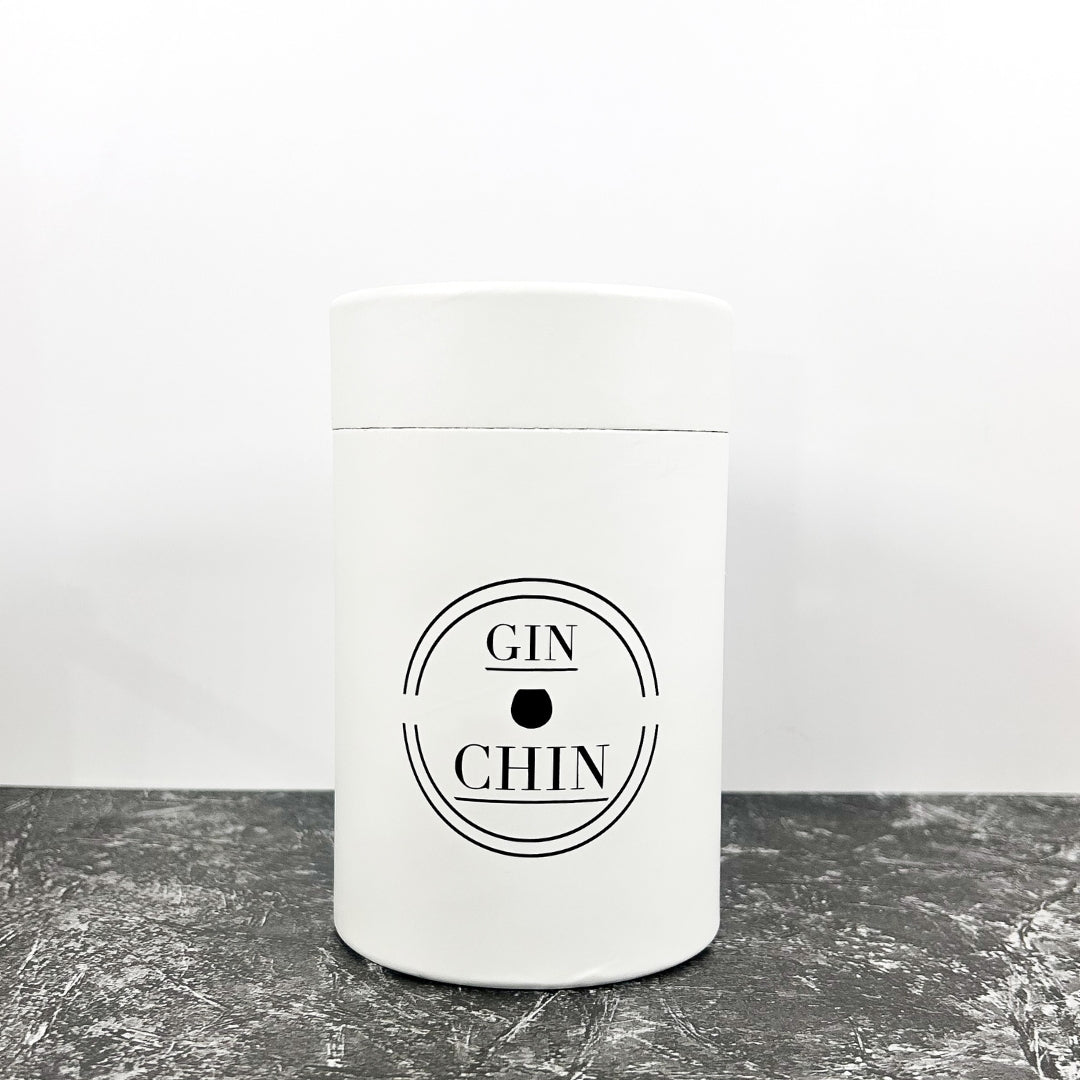 White gift box for insulated travel tumblers with 'GIN CHIN' label on a grey surface